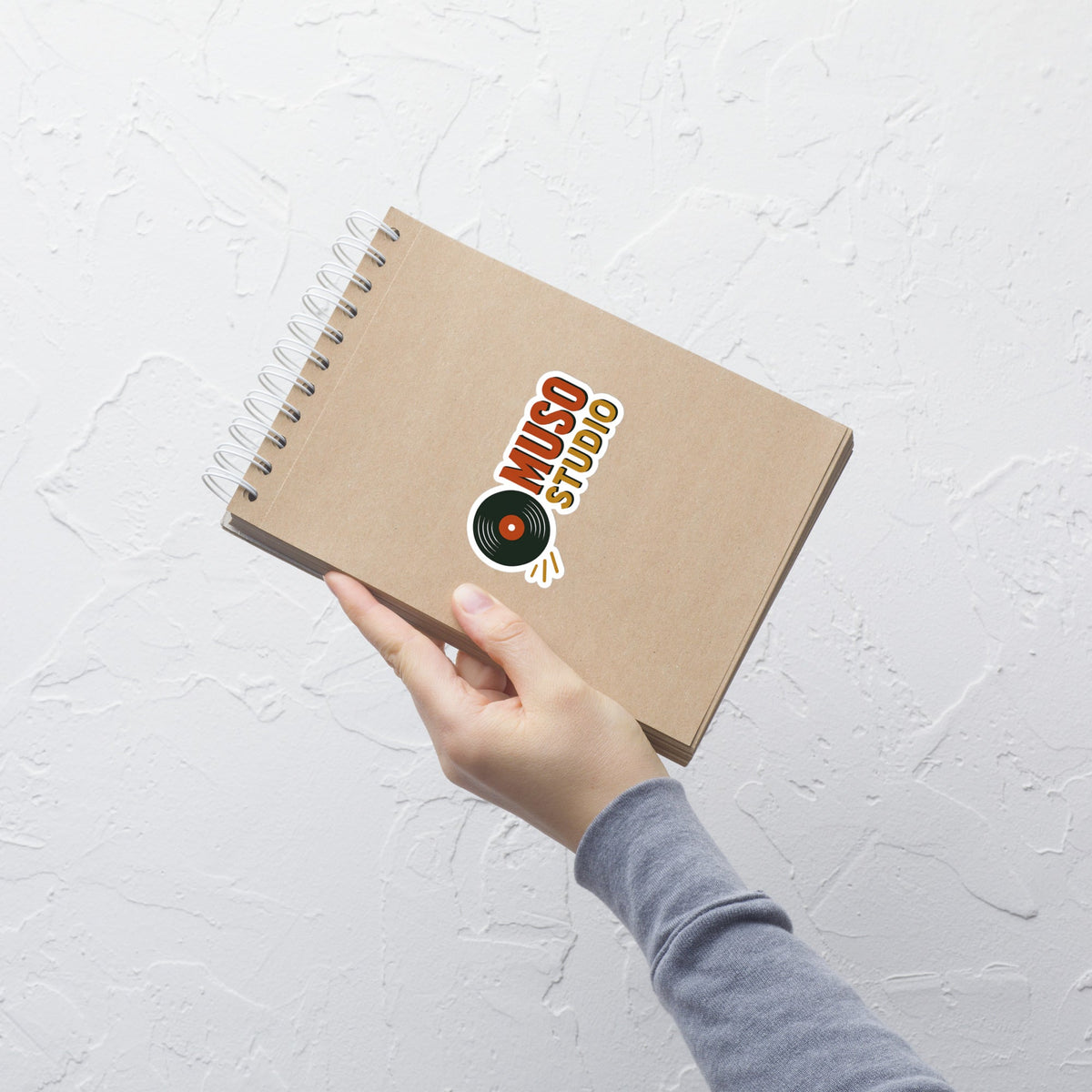 Muso Studio Logo Sticker notebook mockup 4 inch